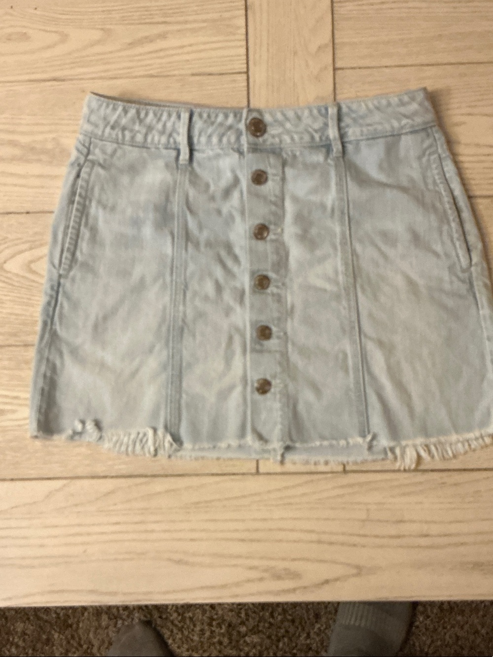 American Eagle Outfitters Light Wash Denim Button-Front Mini Skirt